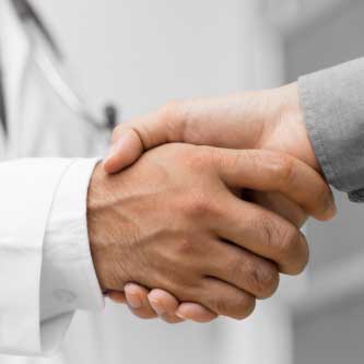 Two people shaking hands