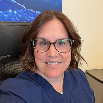 Mary at the front desk ready to call and help you with your healthcare questions