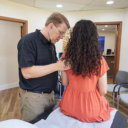 Patient in clinic for testing
